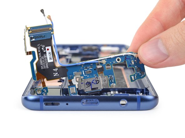 We snag the multi-purpose daughterboard assembly, featuring coaxial interconnect cables, microphone, USB-C connector, and oodles of spring contacts.